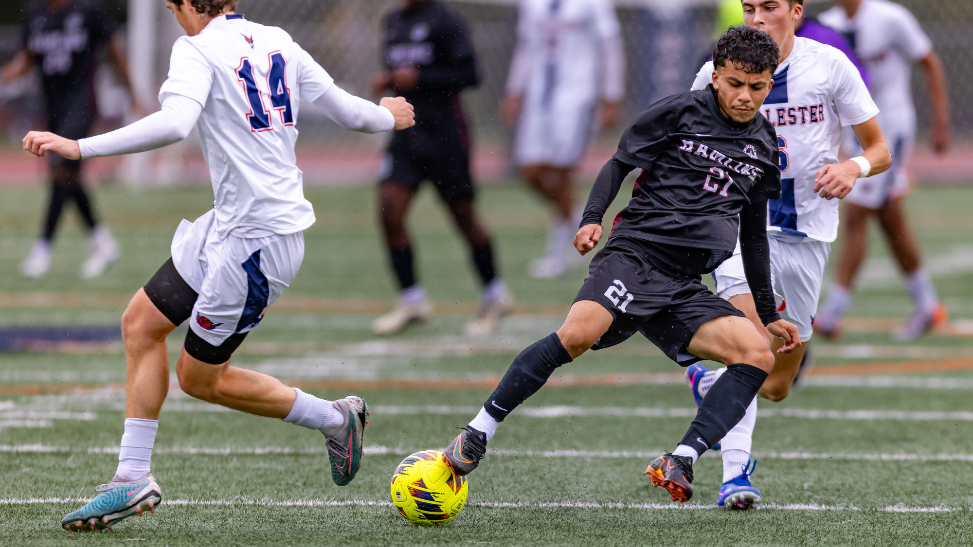 Anthony Porter going after the ball against Macalester
