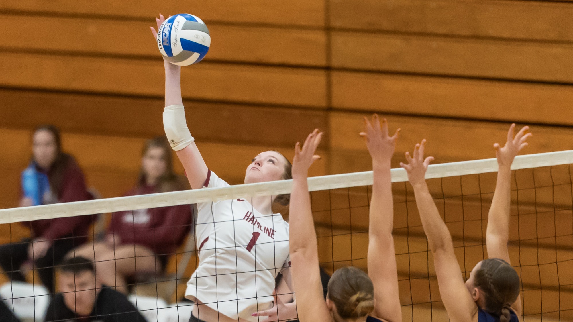 Sophia Johnson going up for the ball against Saint Mary's