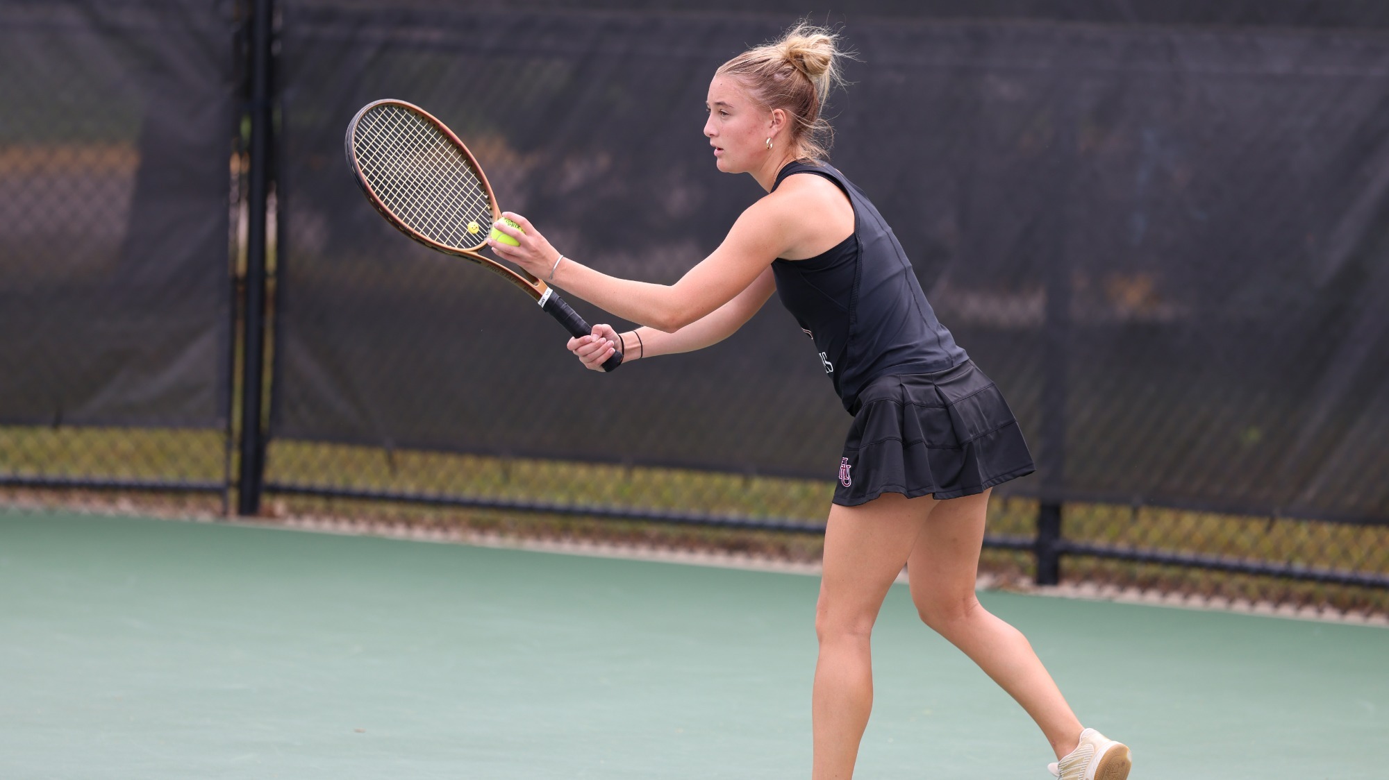 Taylor Copeland getting ready to serve the ball at ITA's