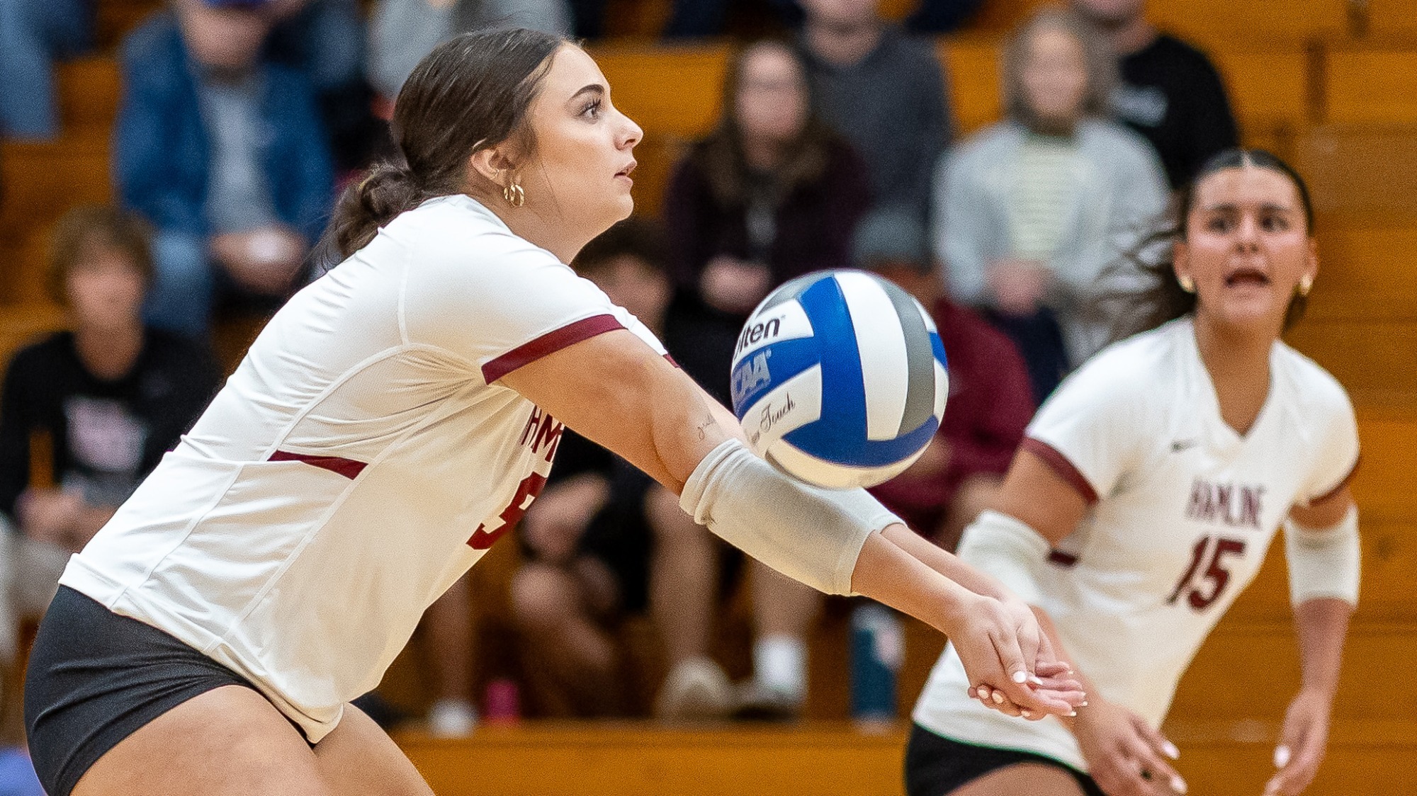 Quincy Asmus digging the ball against SMU