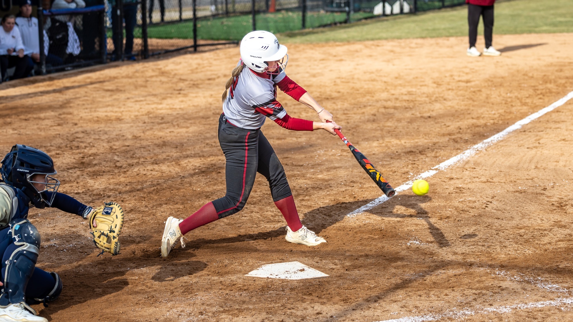 Mikenna Johnson swinging at the ball, Hamline Softball 