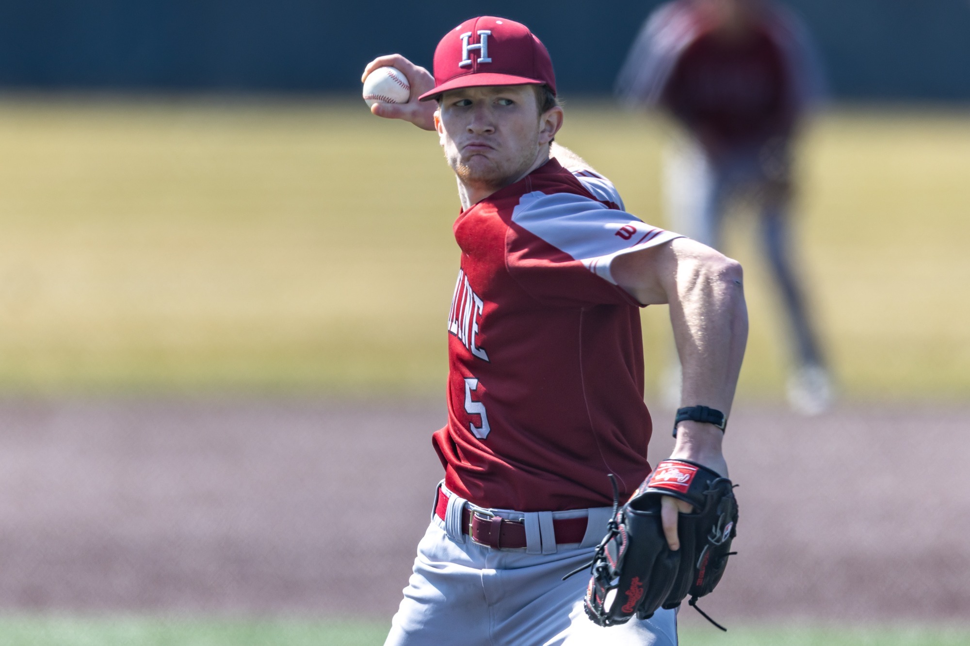Teagan Yotter winds up for pitch against Bethel