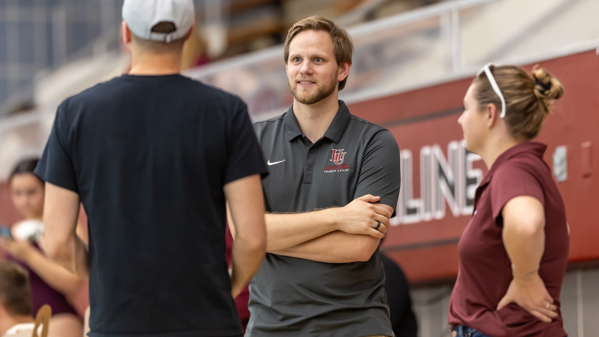Coach Alex Card during swim meet 