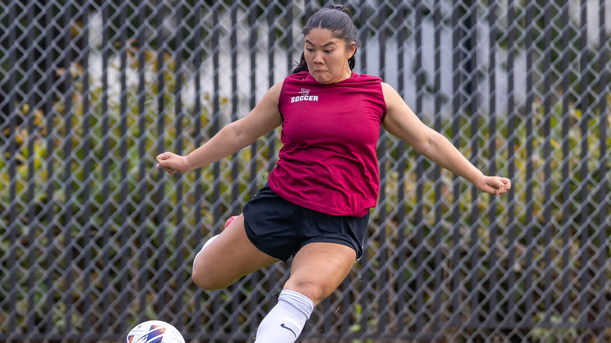 Elysse Tanaka kicking the ball 2026
