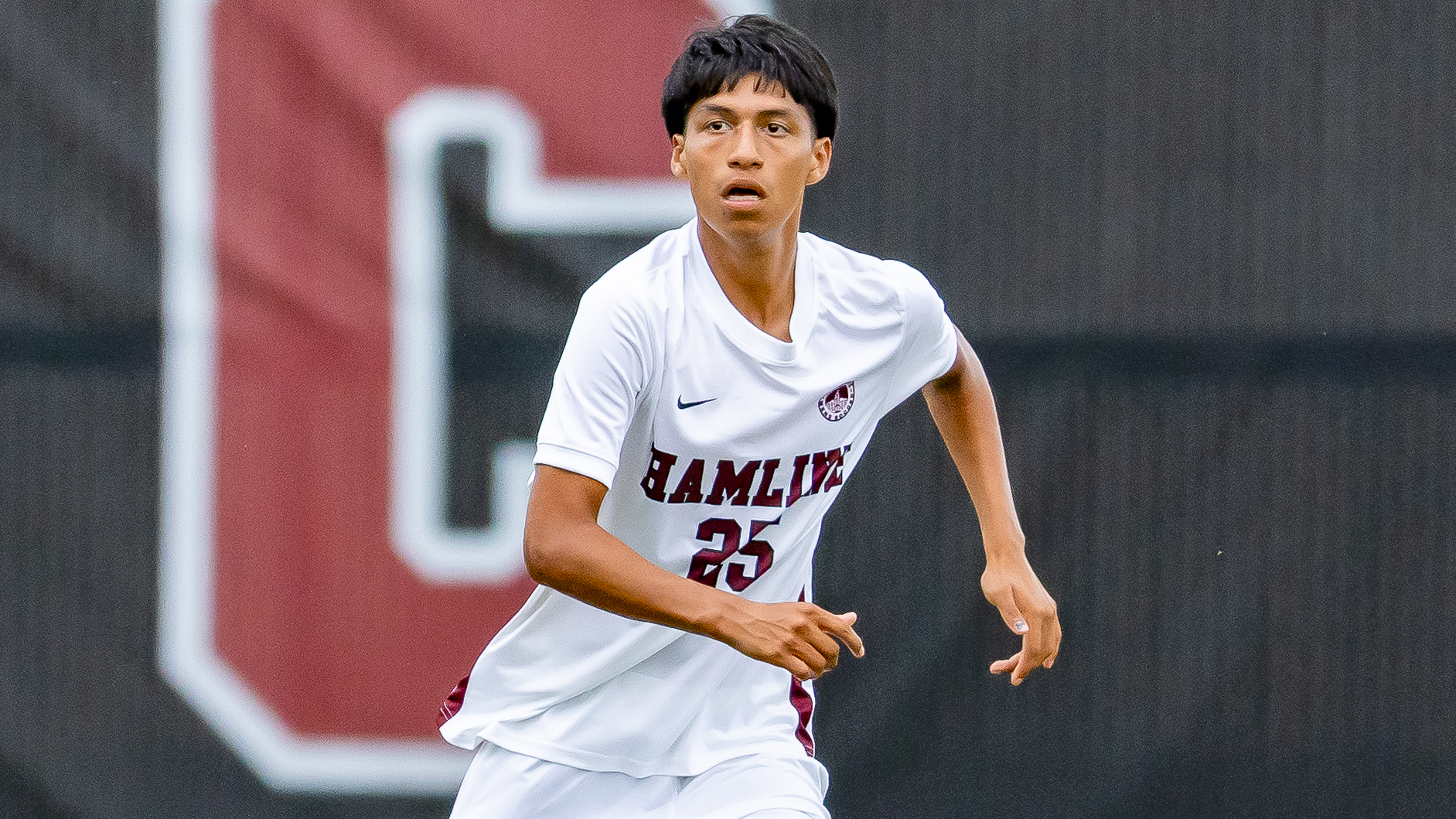 Alan Ruiz running for the ball against Northwestern