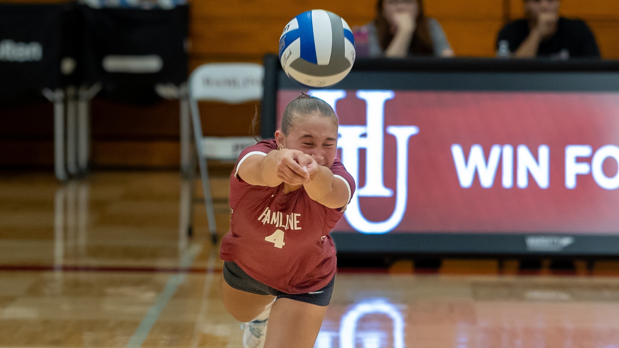 Ava Montanez diving for a ball against North Central