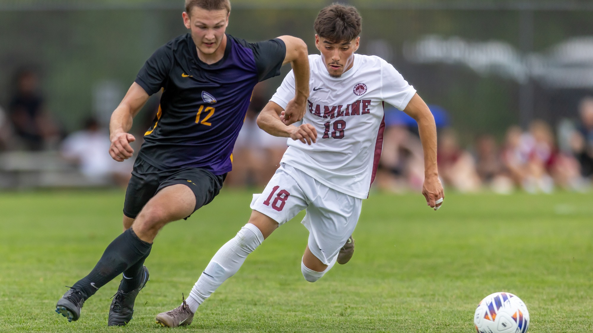 Johanso Camacho battling for the ball against Northwestern 2026
