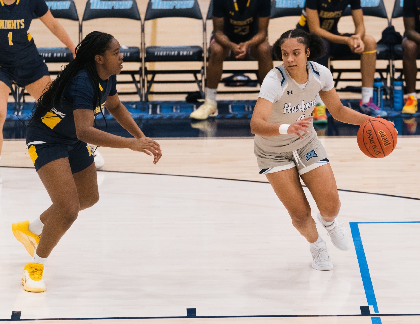 Amya Goodsell (right) sizing up a CCBC Essex defender before scoring two of her team-high 17 points. Photo by Sammy Tomko