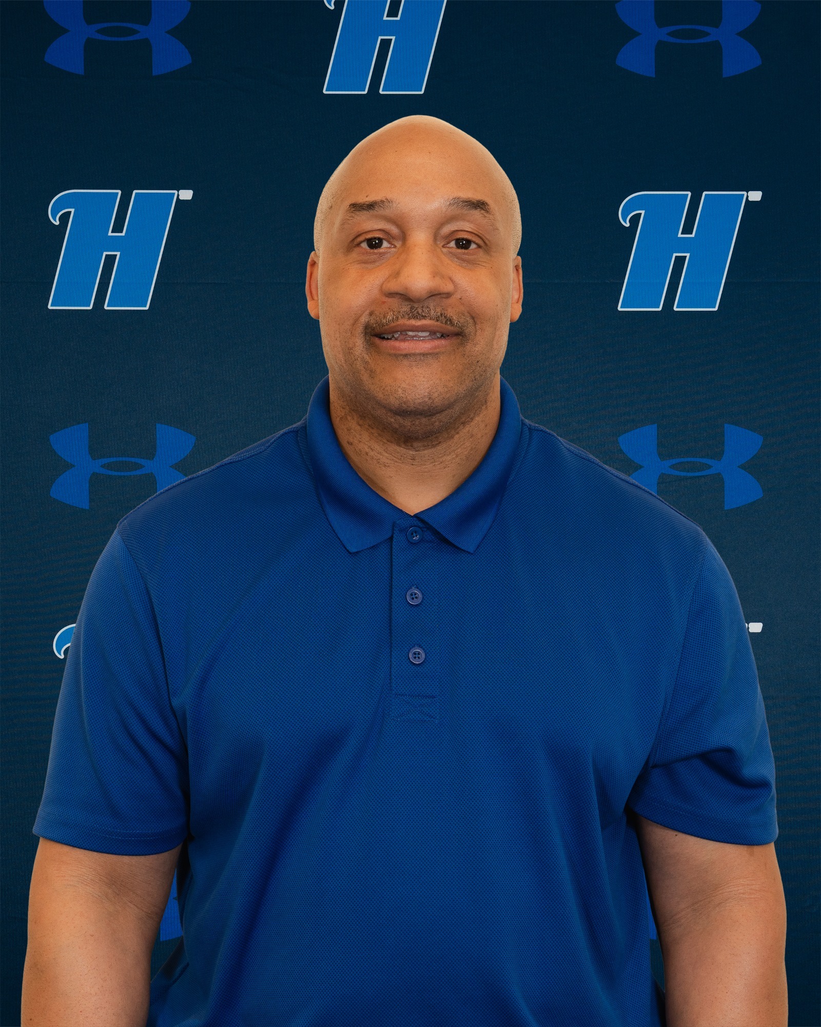 Head women's flag football coach Andre Smalls