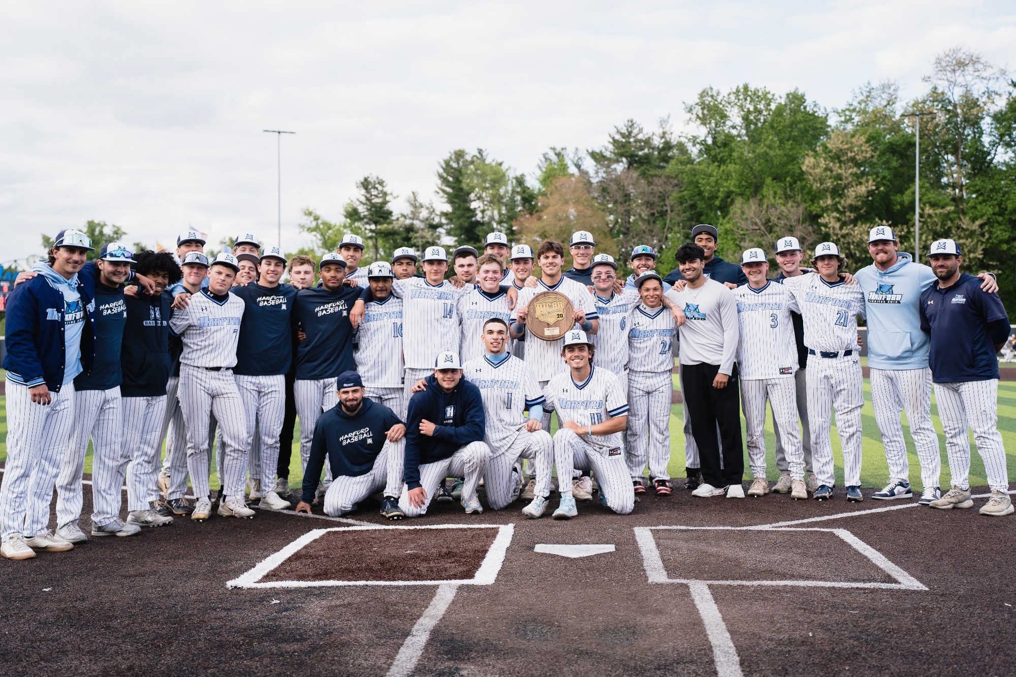 Harford baseball team poses for a photo after winning regional title 