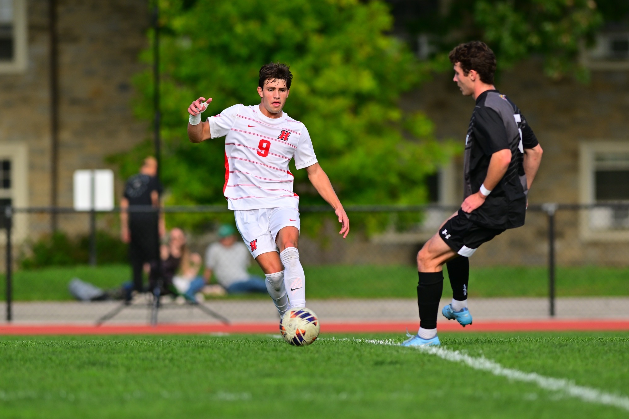 Charles Sharp dribbles versus WAC