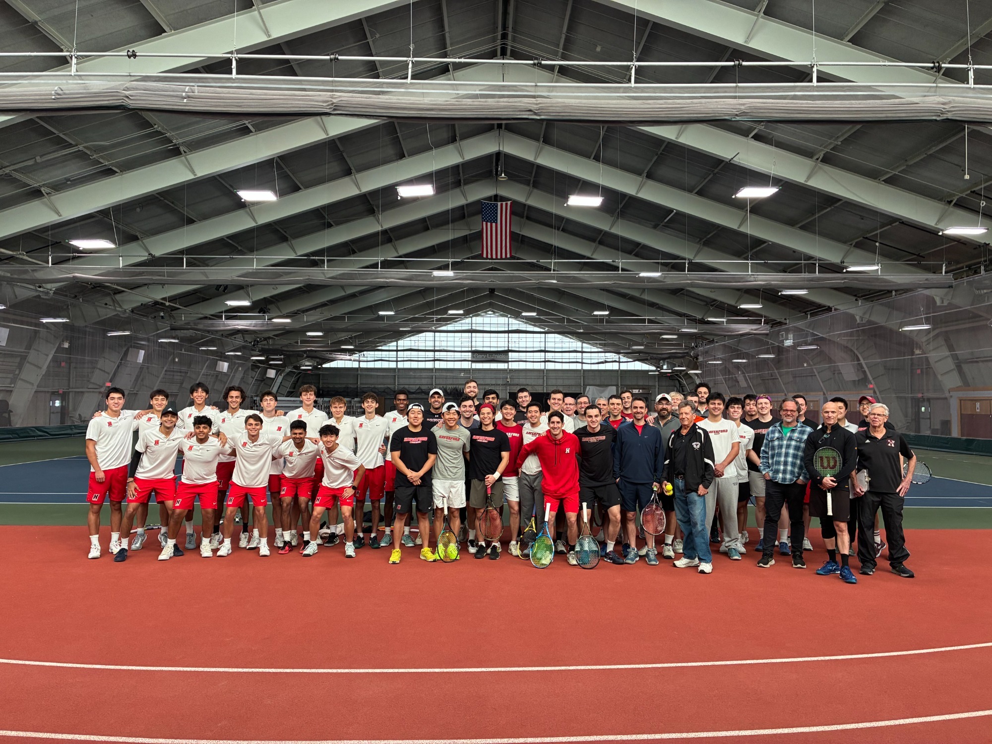Men's Tennis alums gather in the field house on Saturday, October 24 