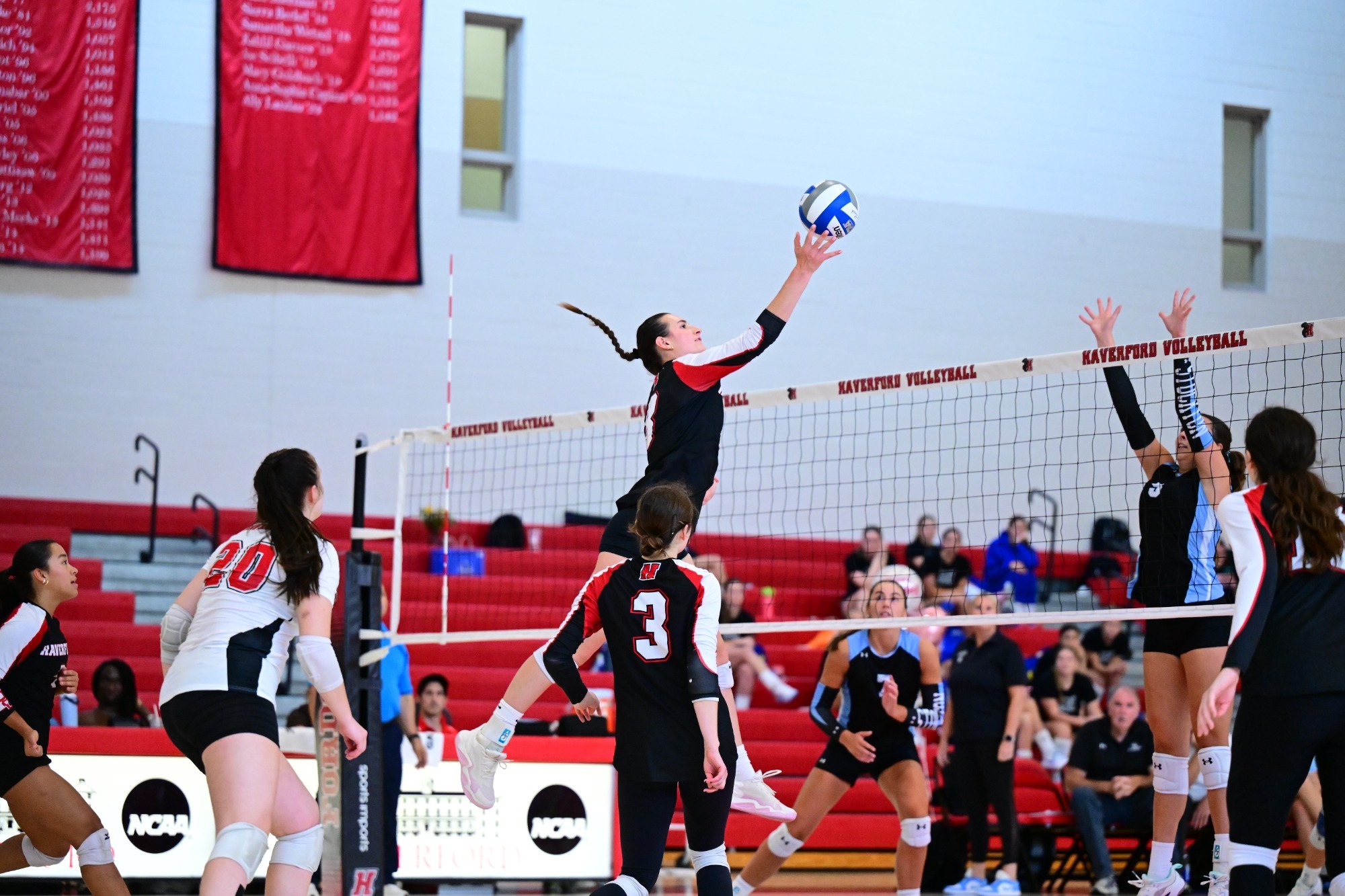Maggie Turner attacks in the middle against Stockton