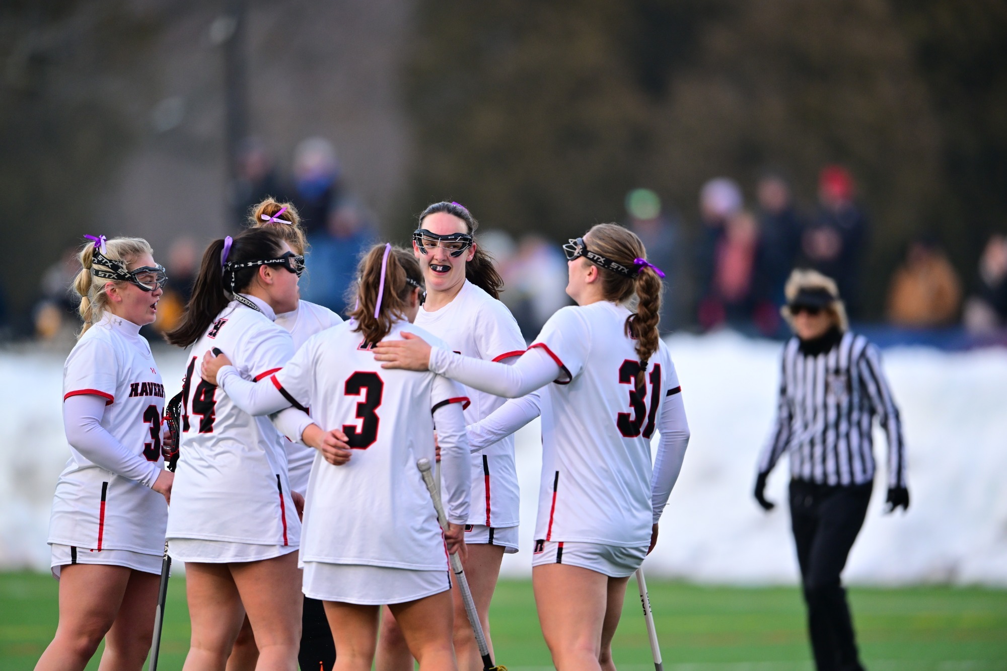 Haverford Women's Lacrosse huddle after goal against Widener 