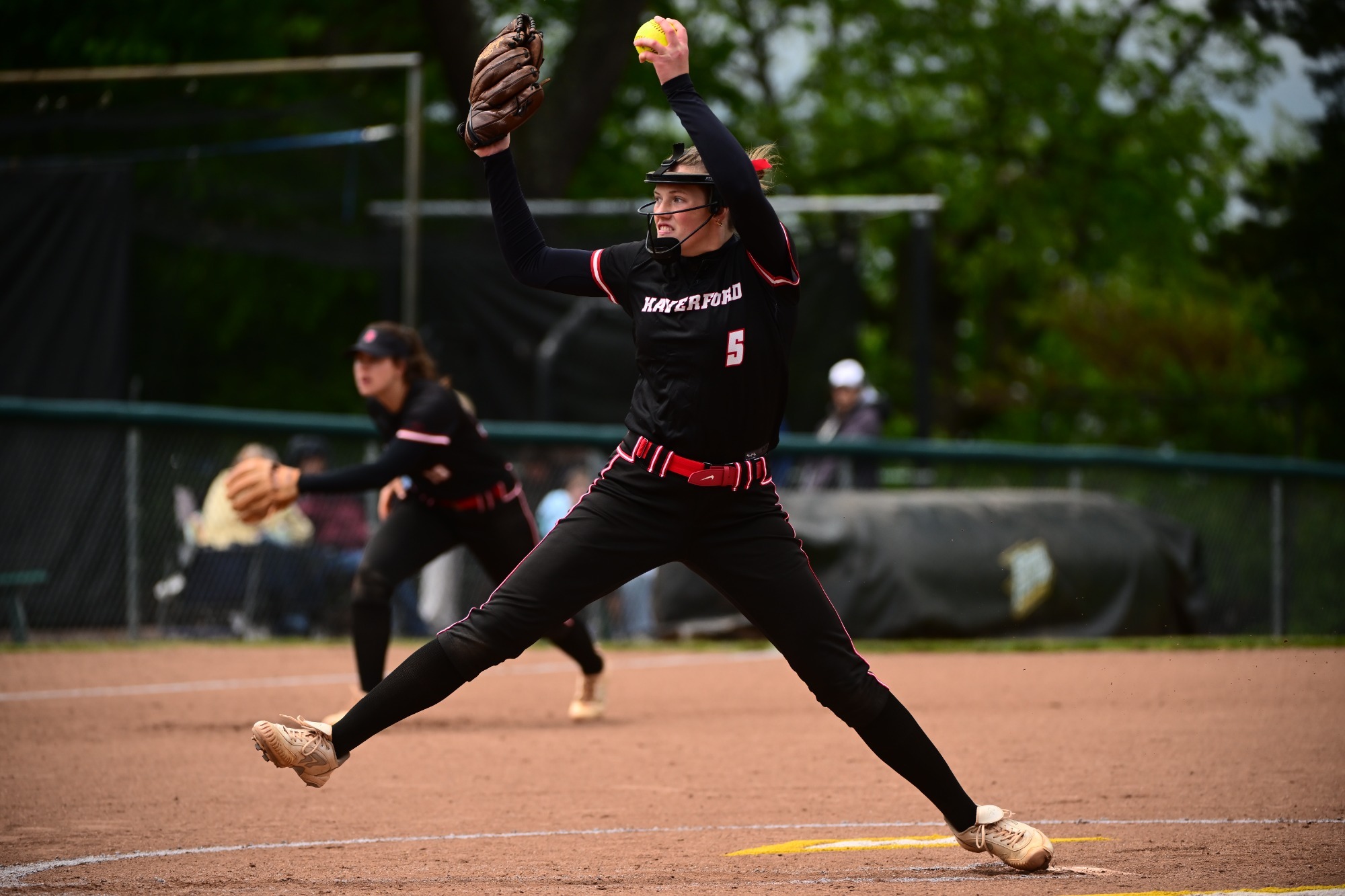 Kaleigh Bodak pitching against McDaniel. She is very good at softball. 