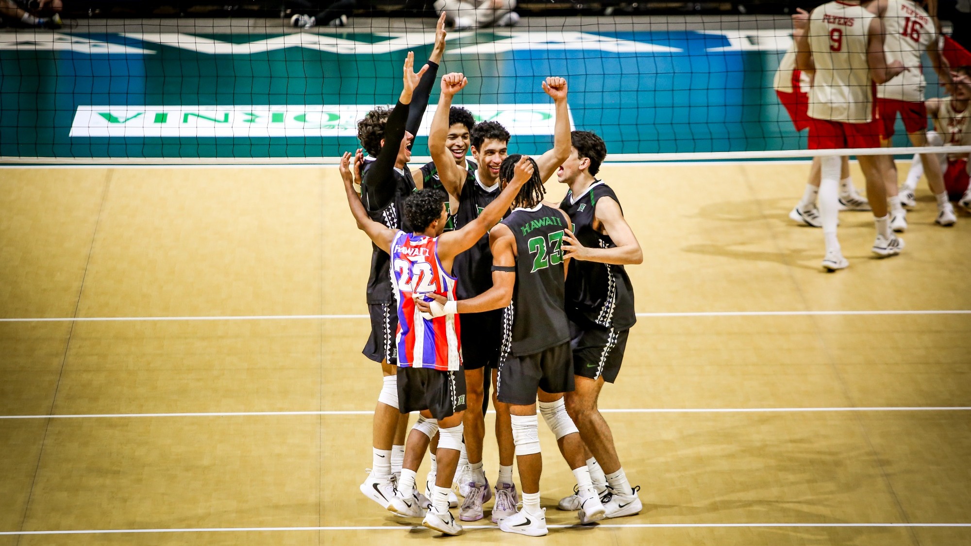 Team celebration vs. Lewis