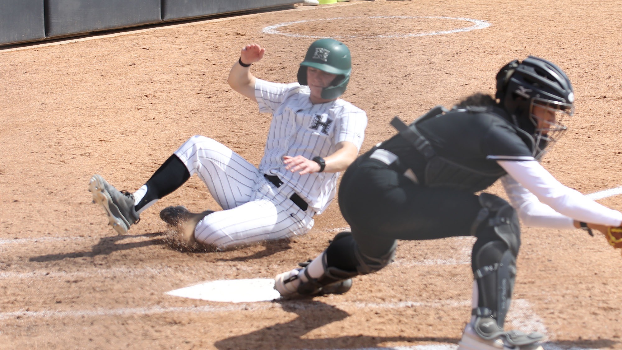 Maycen Gibbs slides home