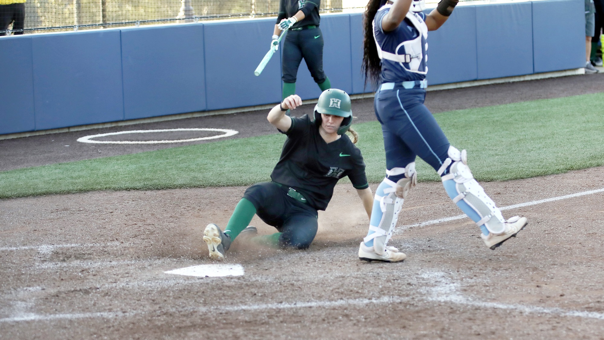 Maycen Gibbs slides home