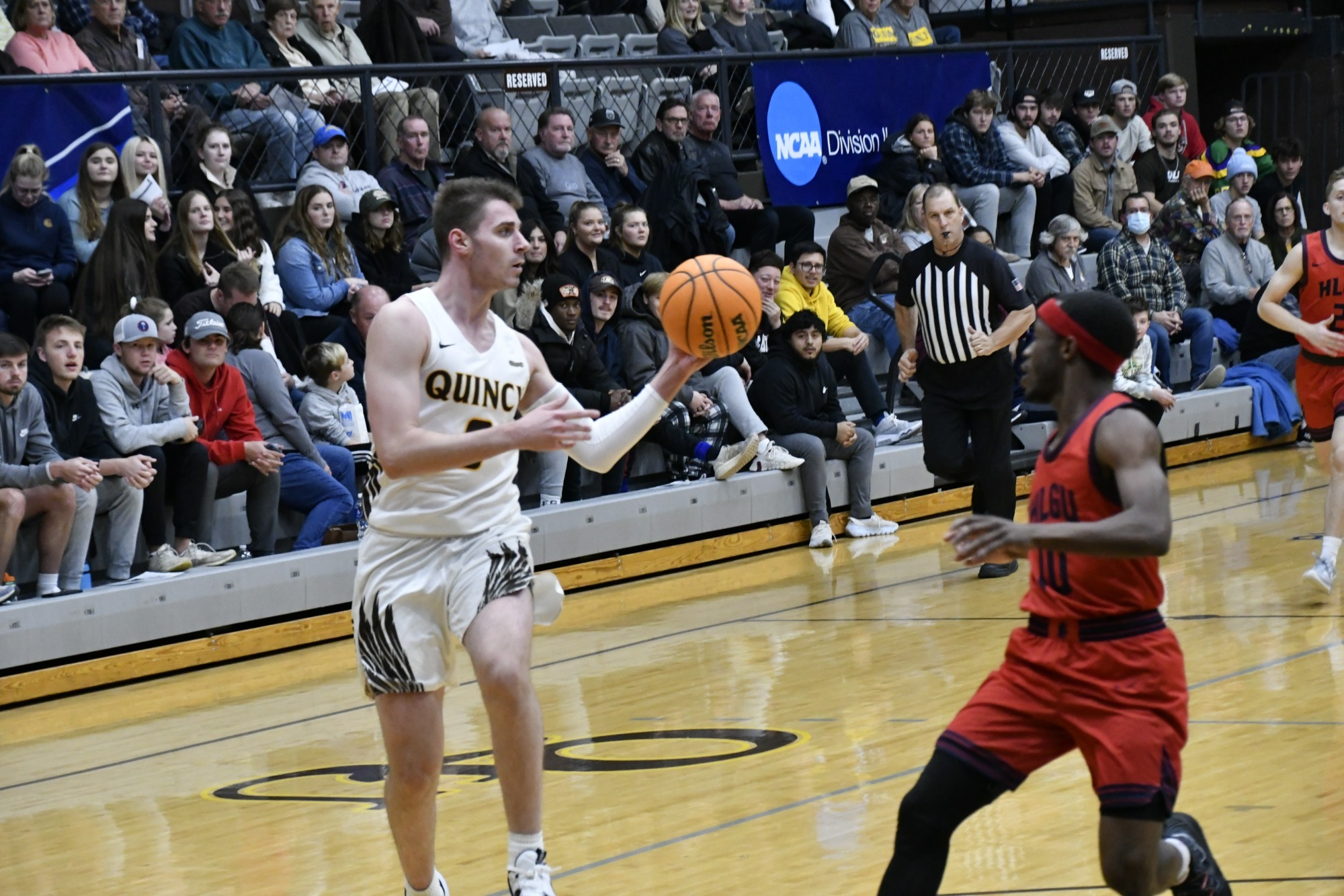 Men's Basketball Opens Road Swing with Win Quincy University Athletics
