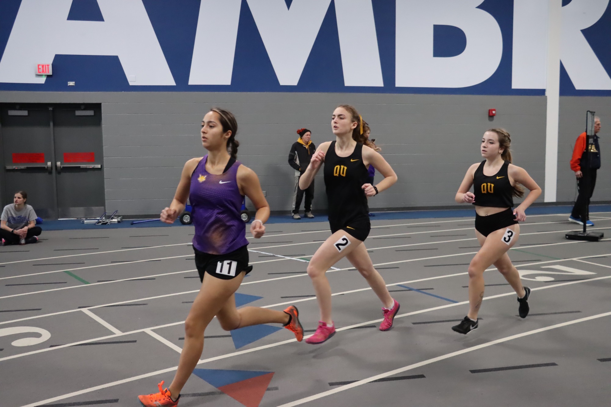 Bri Obermaier runs with other athletes.