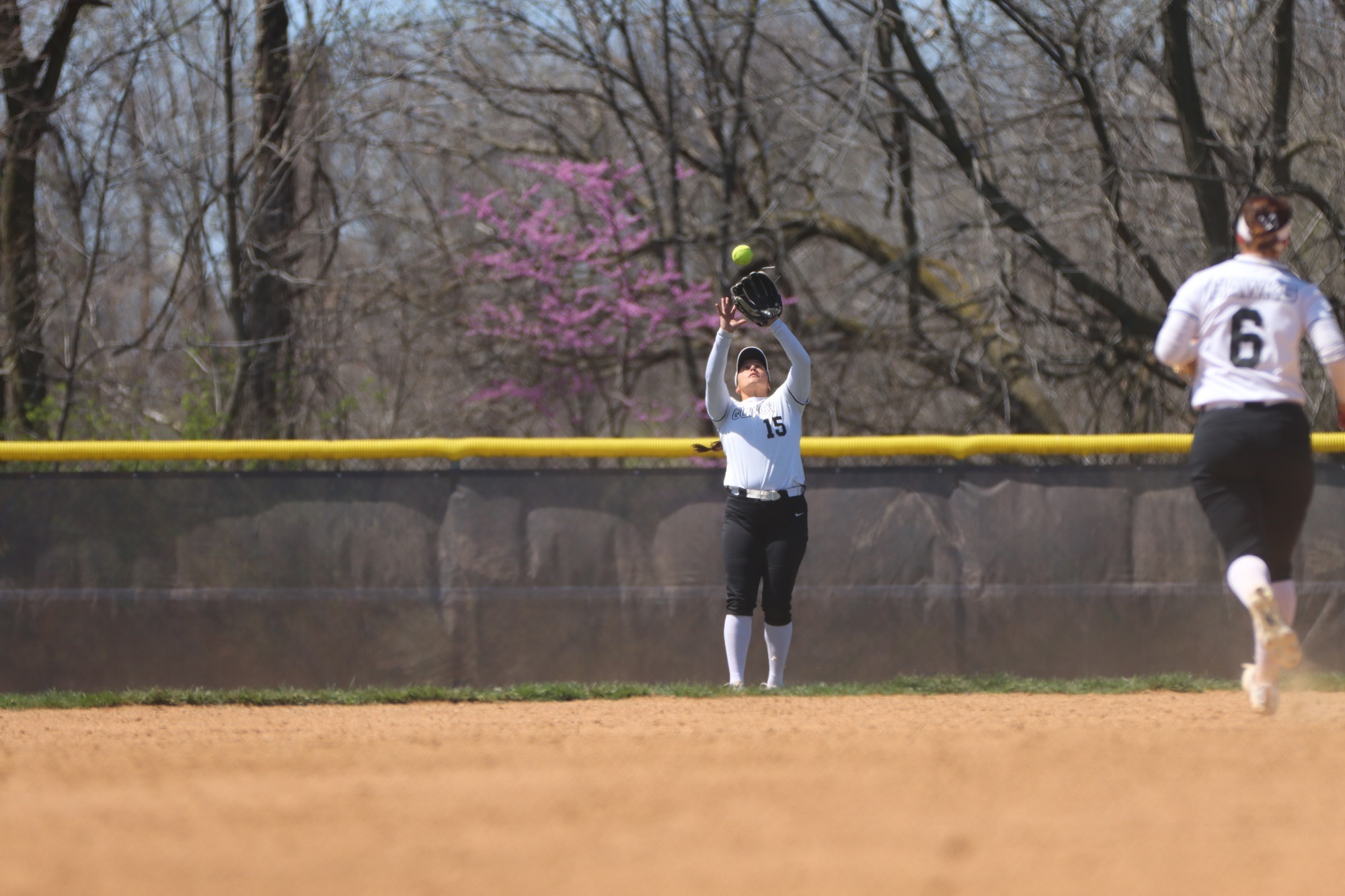 Isabella Shields catches a ball in left field. 
