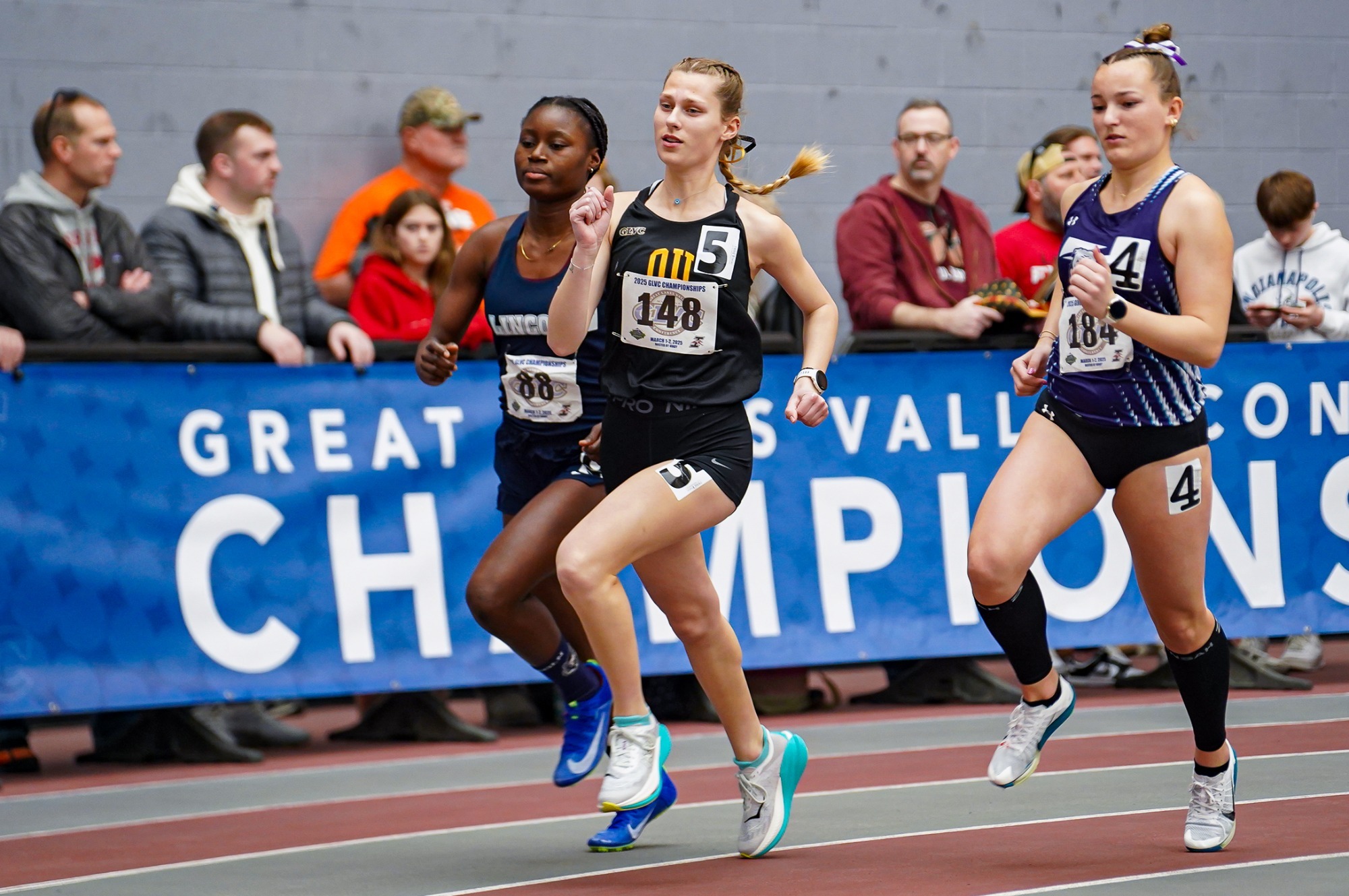 Katie Park runs indoor track