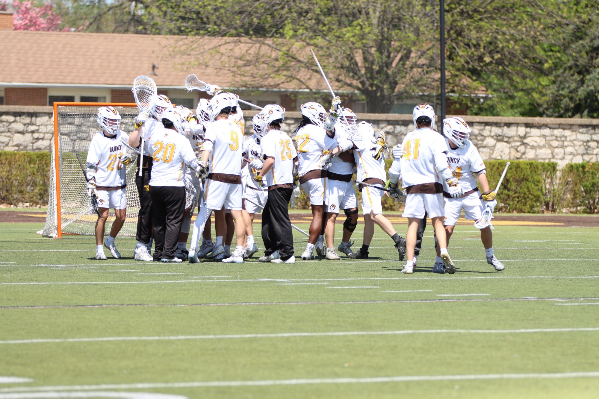 QU MLAX celebrate