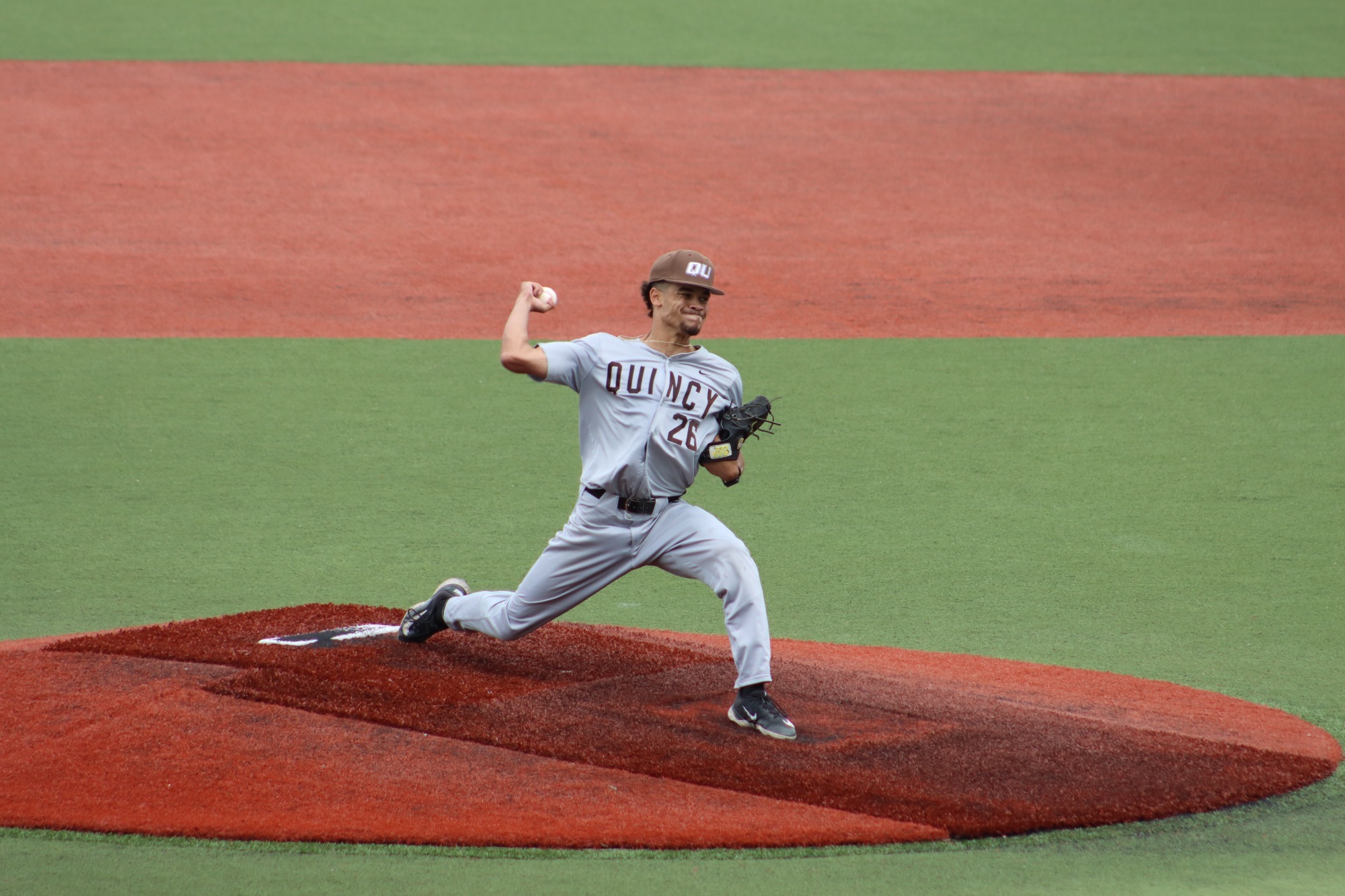 Kobe Essien snapping a breaking ball.