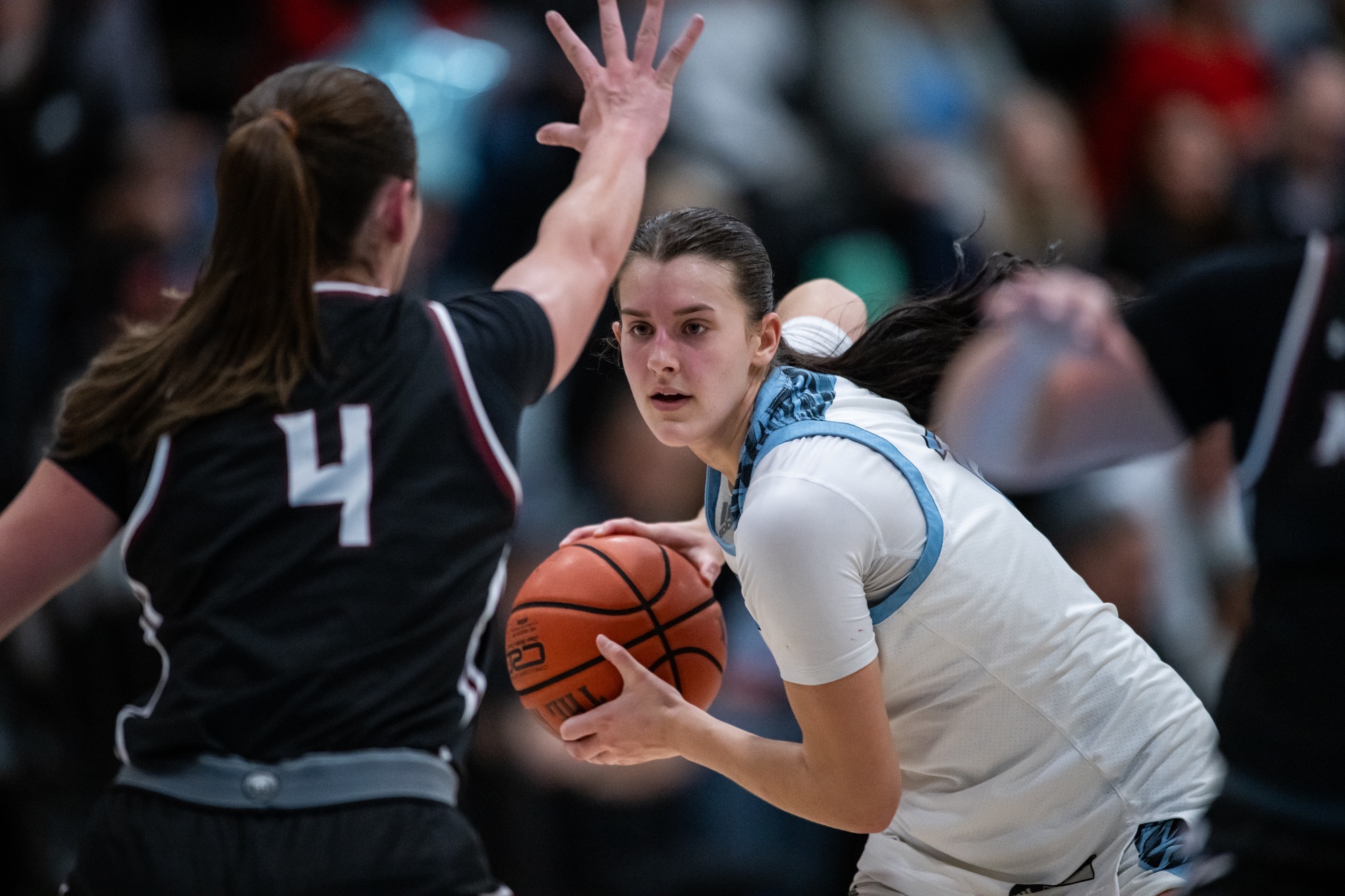 A closeup of Claire Dougherty in the triple-threat position