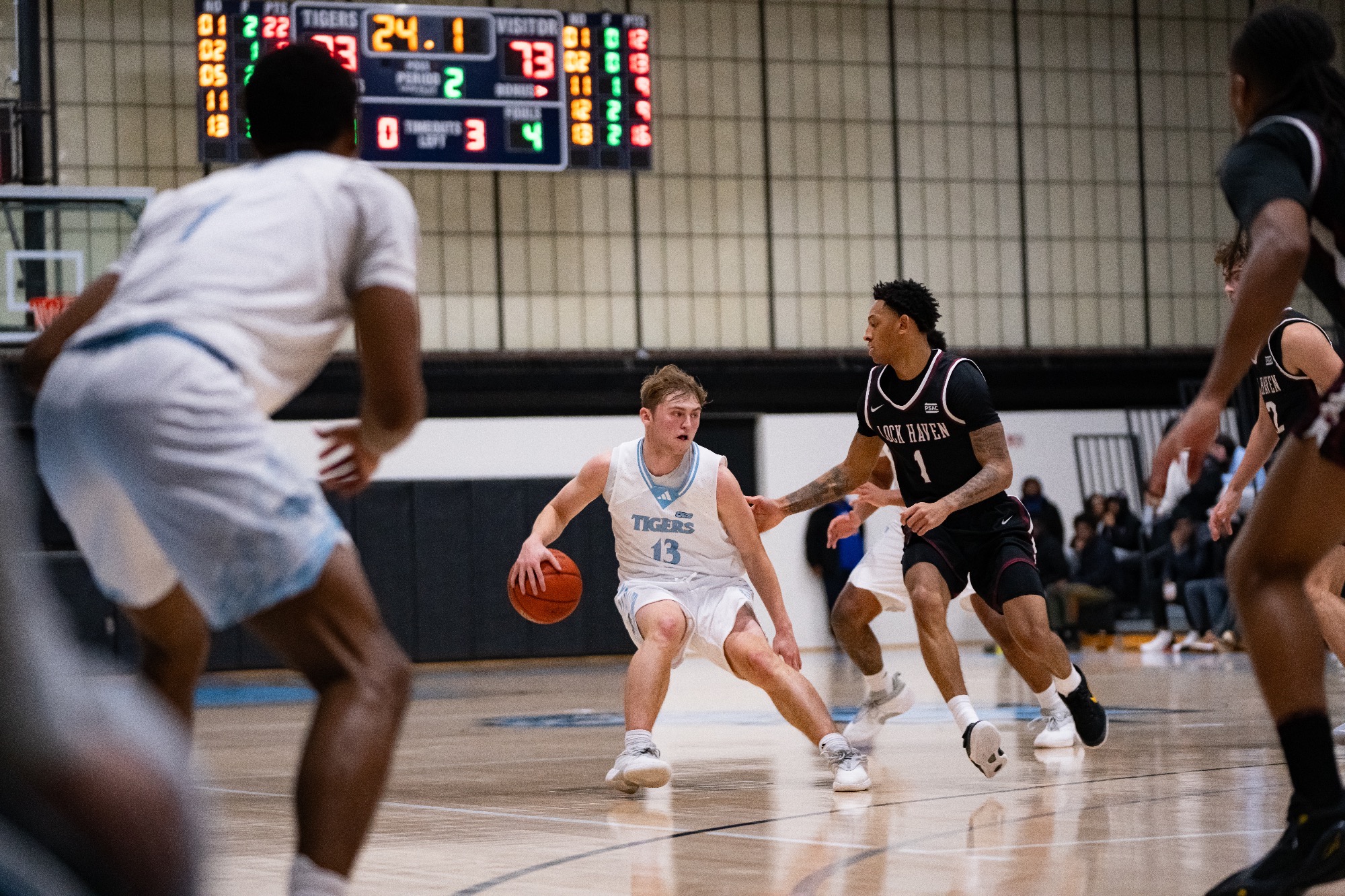 Matt Gardler about to dribble behind his back, with the ball in his right hand