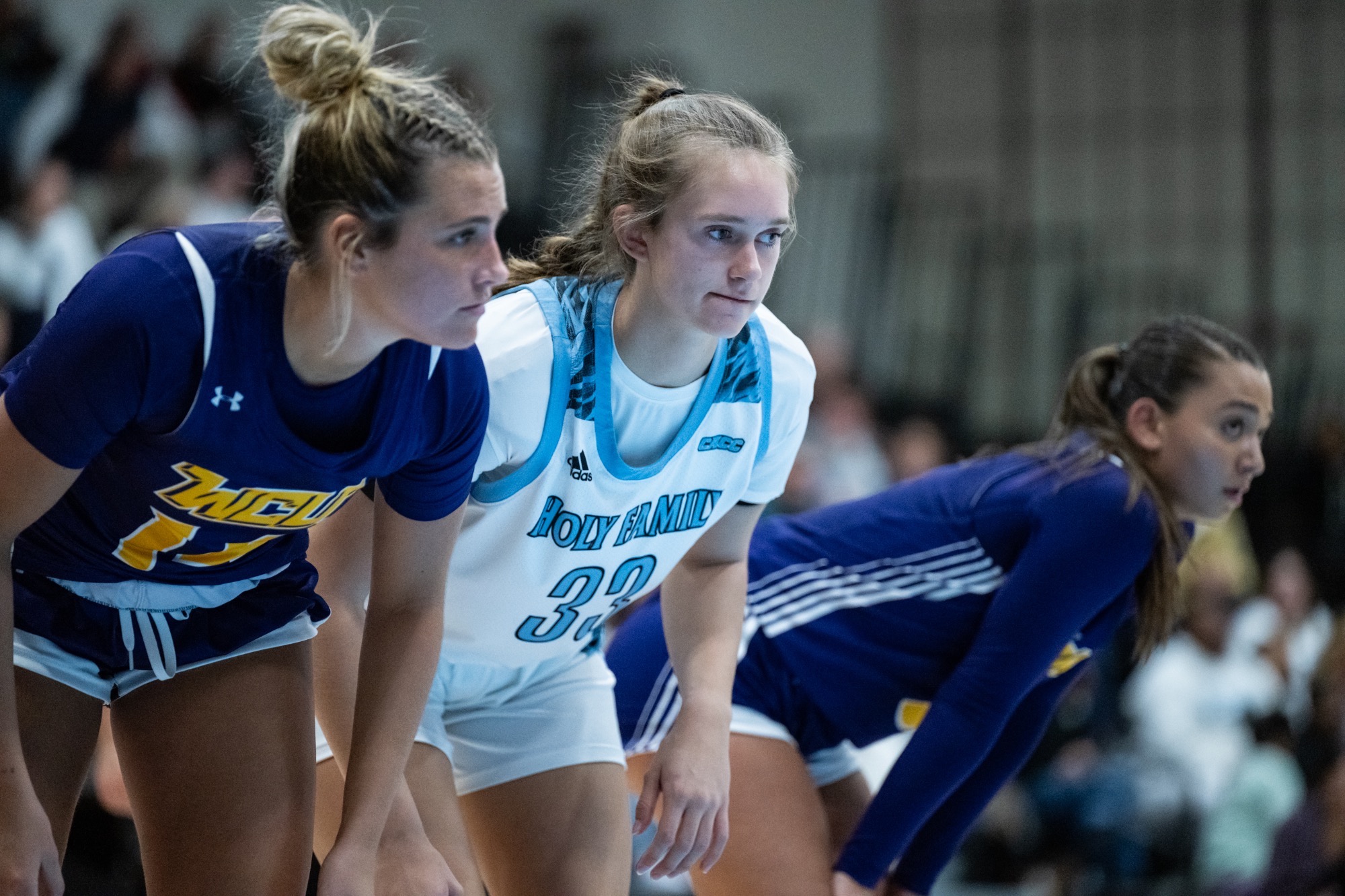A closeup of Lauren Palangio on the blocks, preparing for a free throw to be shot