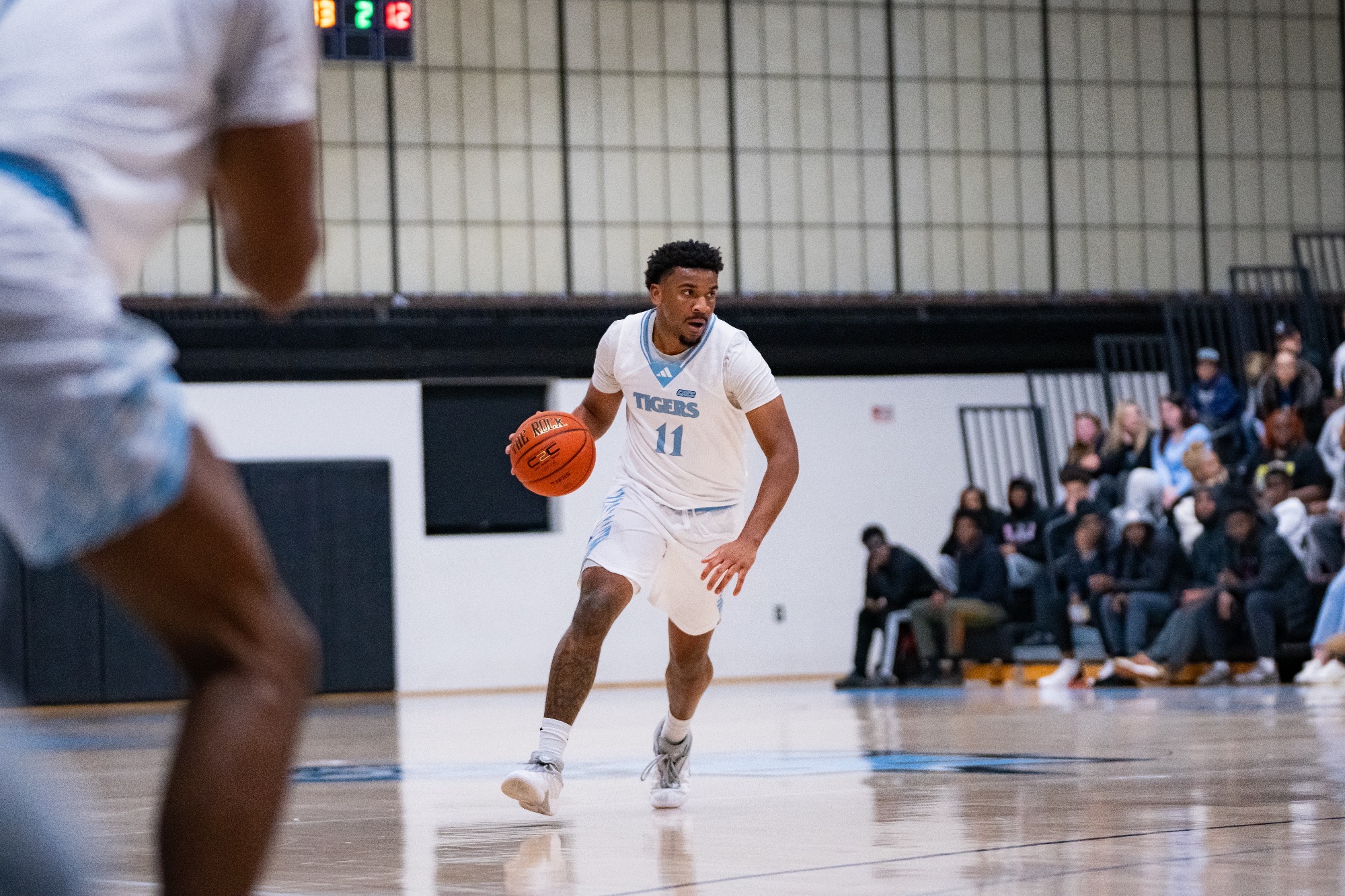 Omarion Jett looking focused as he dribbles