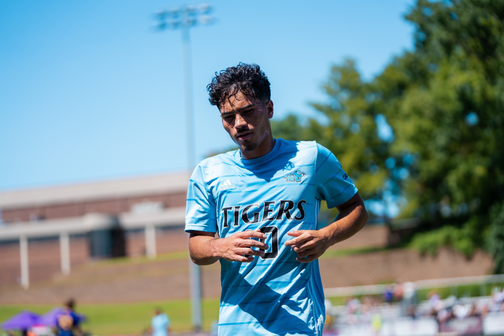 A closeup of Luiz Recchimuzzi jogging