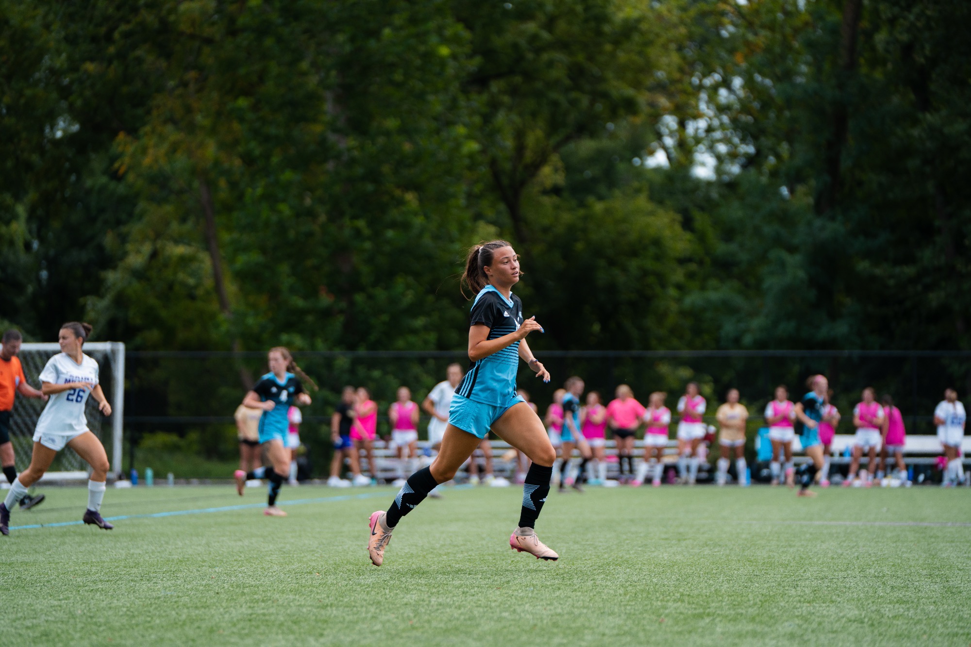 Kayla Dunn runs on the field