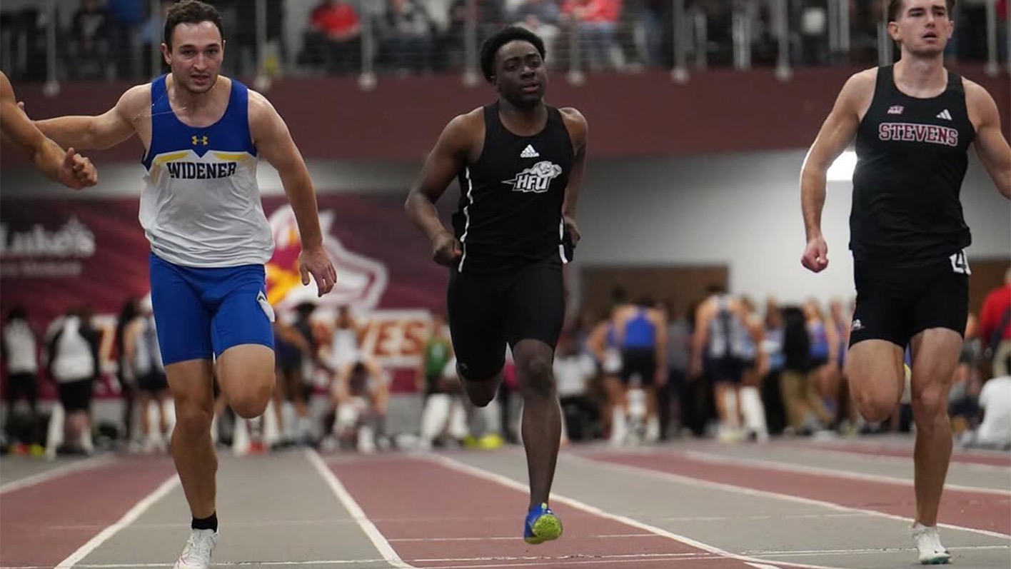 Ryder Benjamin sprinting, in-between two competitors