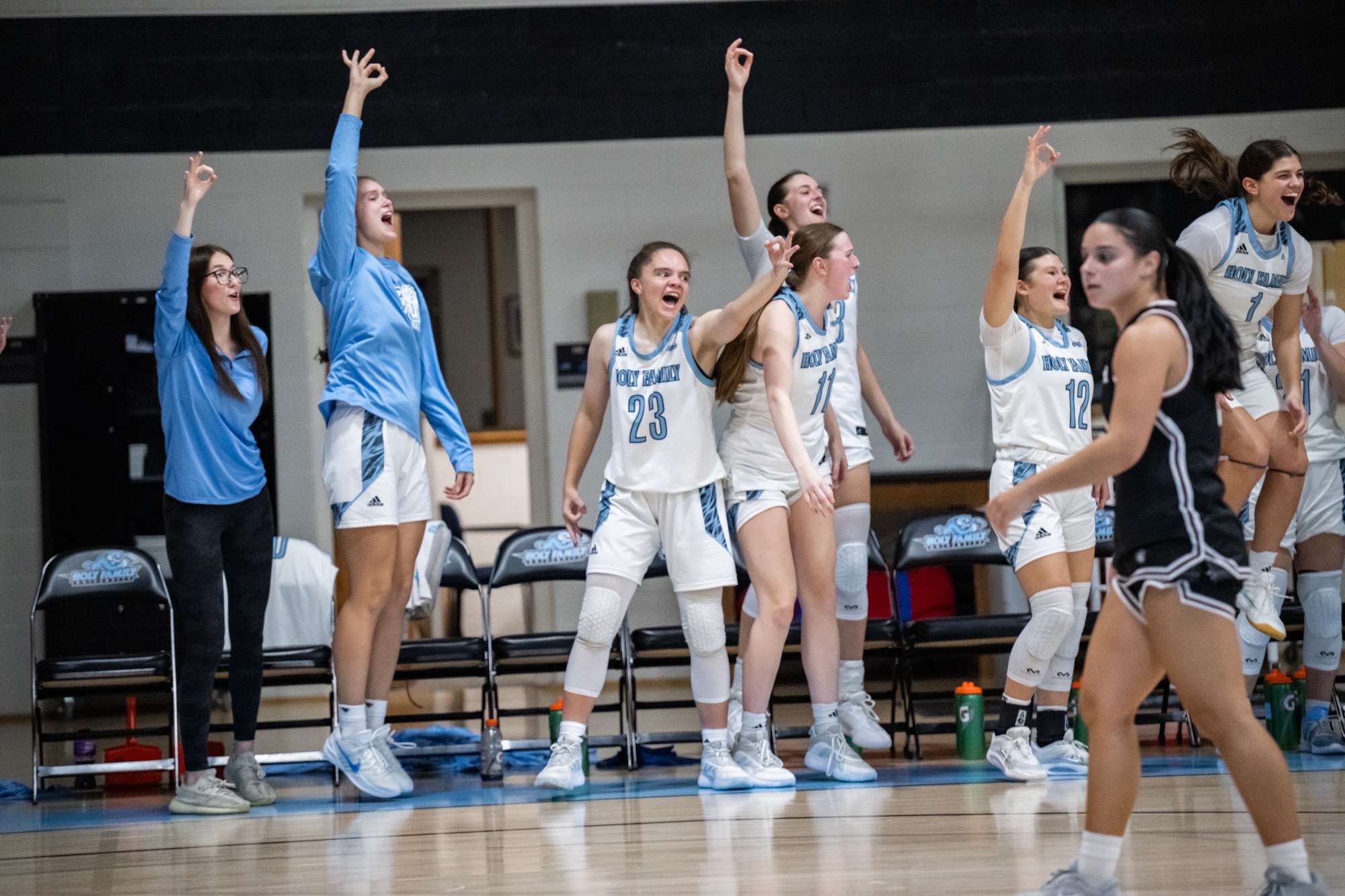 The HFU Women's Basketball Bench celebrates a 3-pointer