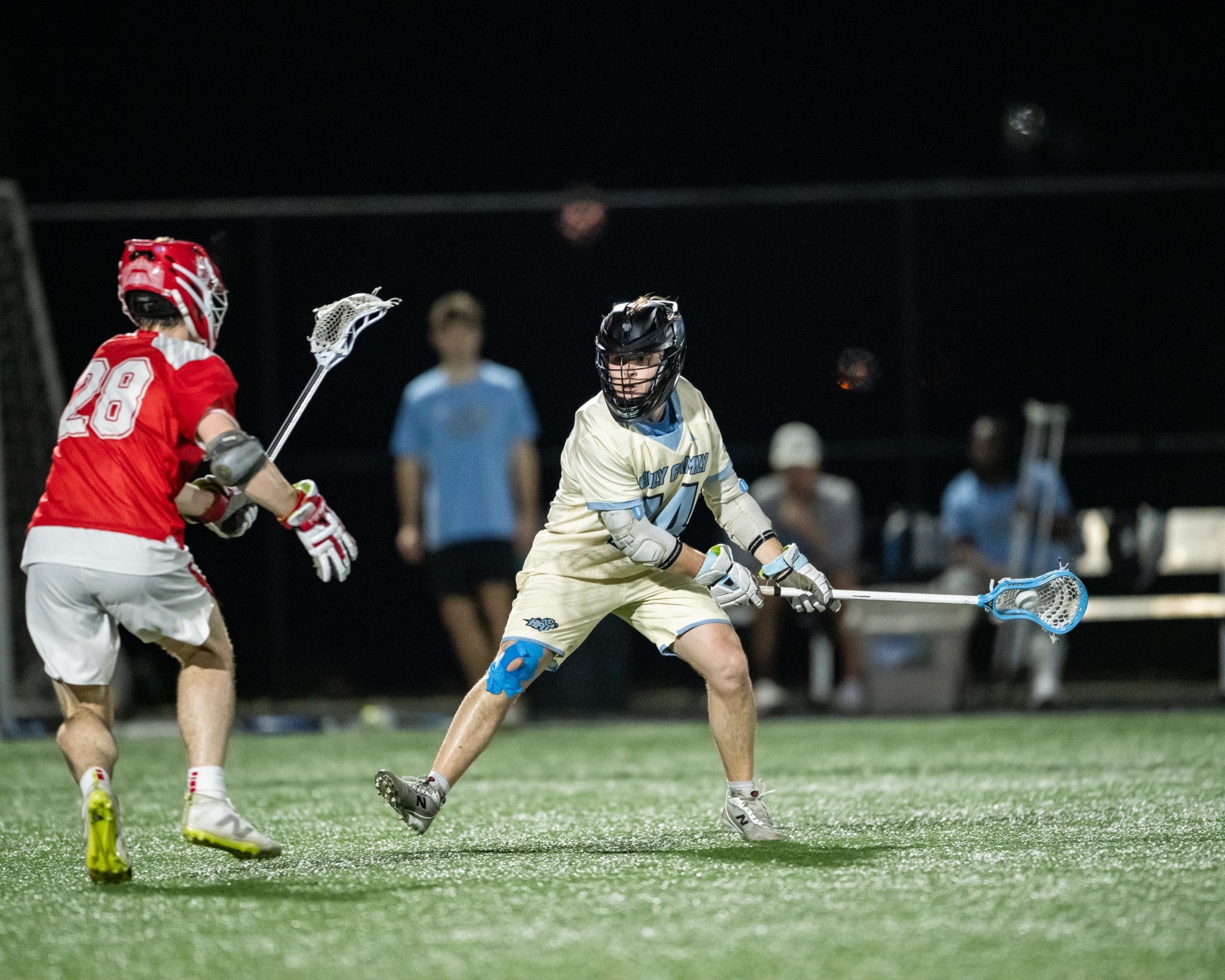 Noah Simpson about to shoot, his stick low and parallel to the ground