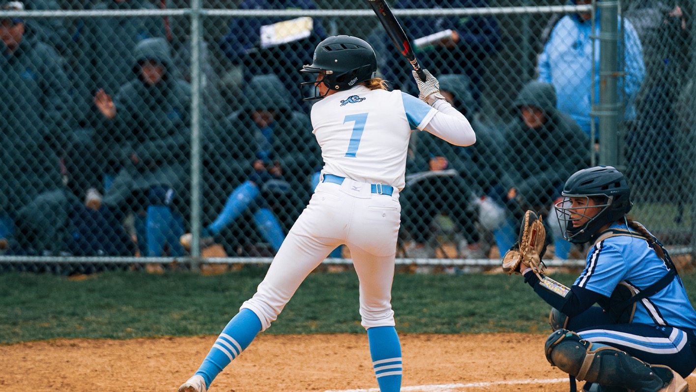A picture, from the side, of Right-hand Lily Hoban preparing for a pitch to be thrown