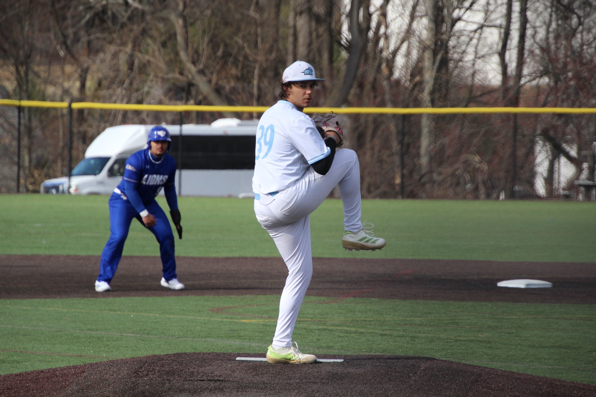 Left-handed pitcher Alexander Ortiz delivering a pitch
