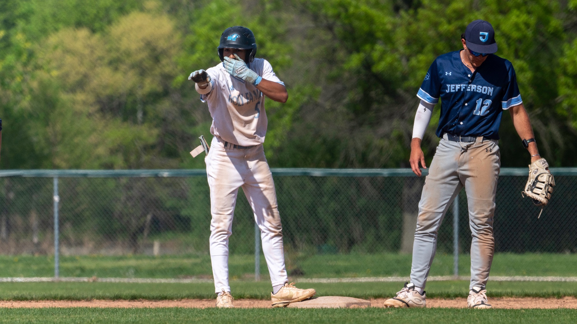 Jalen David celebrates on second base after a double 