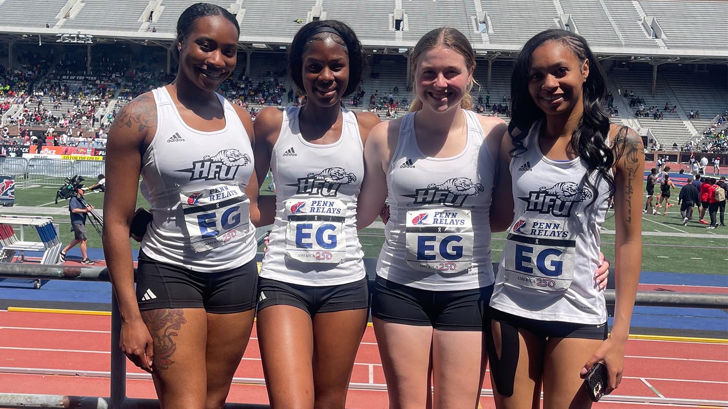 A group of the women's 4x100m relay team at the 2026 Penn Relays