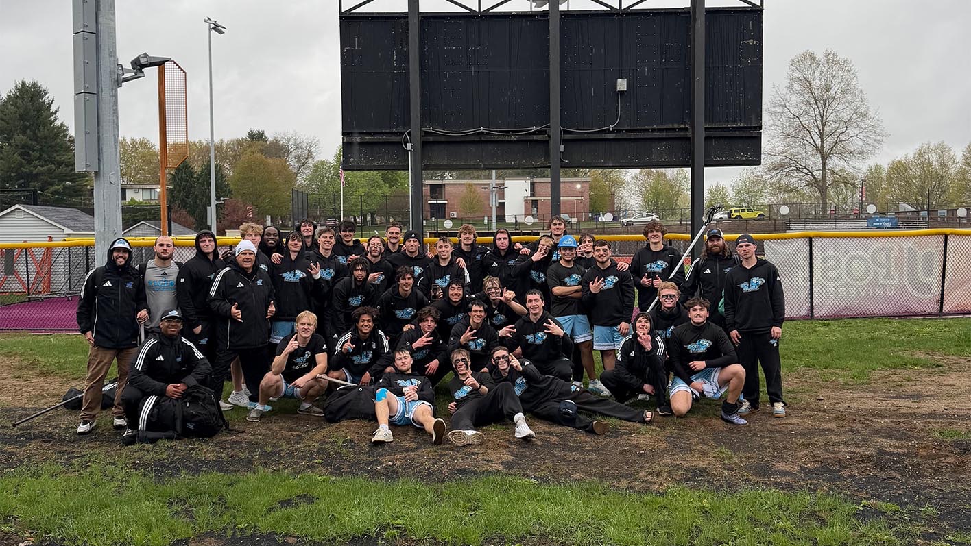 The HFU Men's Lacrosse Team celebrates their 2026 CACC Tournament First Round triumph at Post