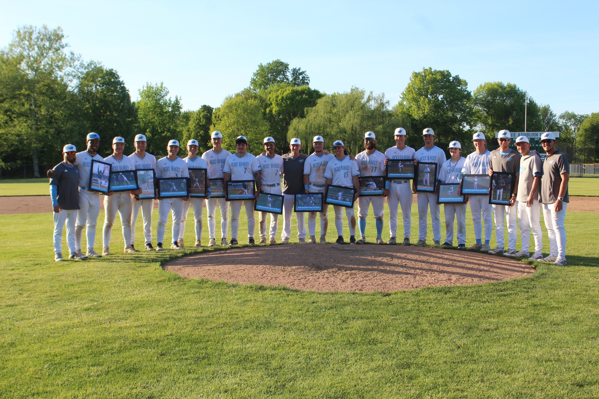The HFU Baseball Class of 2026 takes a group picture behind the mound