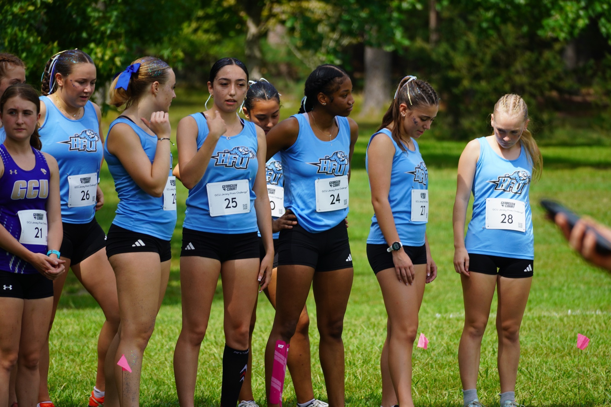 Members of the HFU Women's Cross Country Team line up at the starting line of the 2026 GCU Pine Barrens Challenge