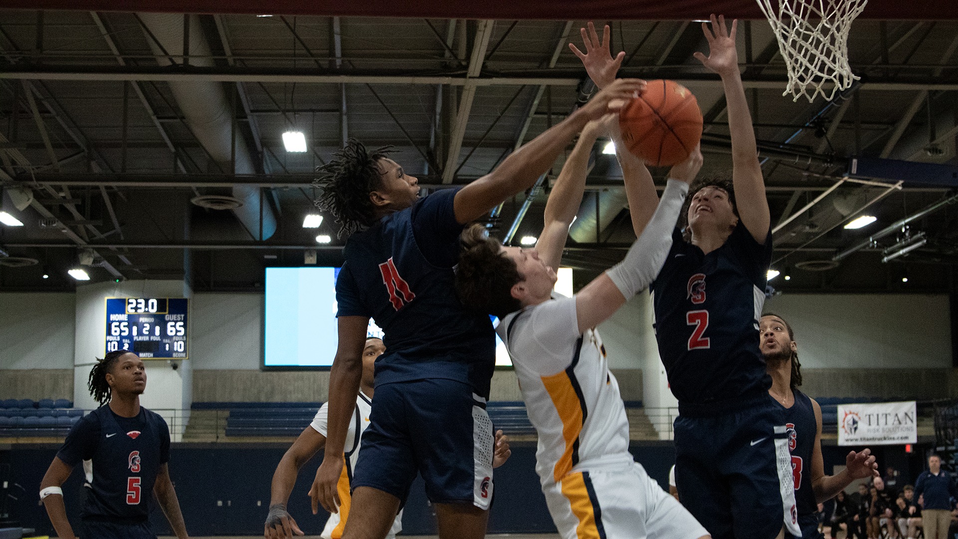 Colton Knoll draws a foul while battling through contact on a layup attempt against Southwestern CC