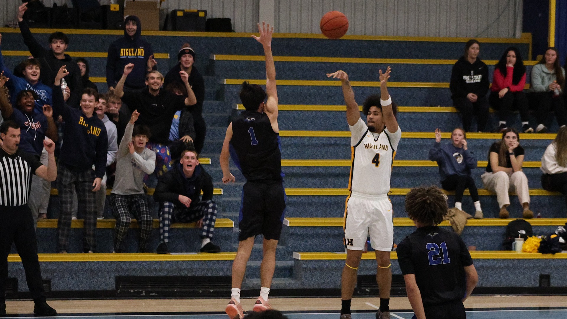 Tavian Tate knocks down a three pointer in Highland's 134-54 win over Kansas Christian