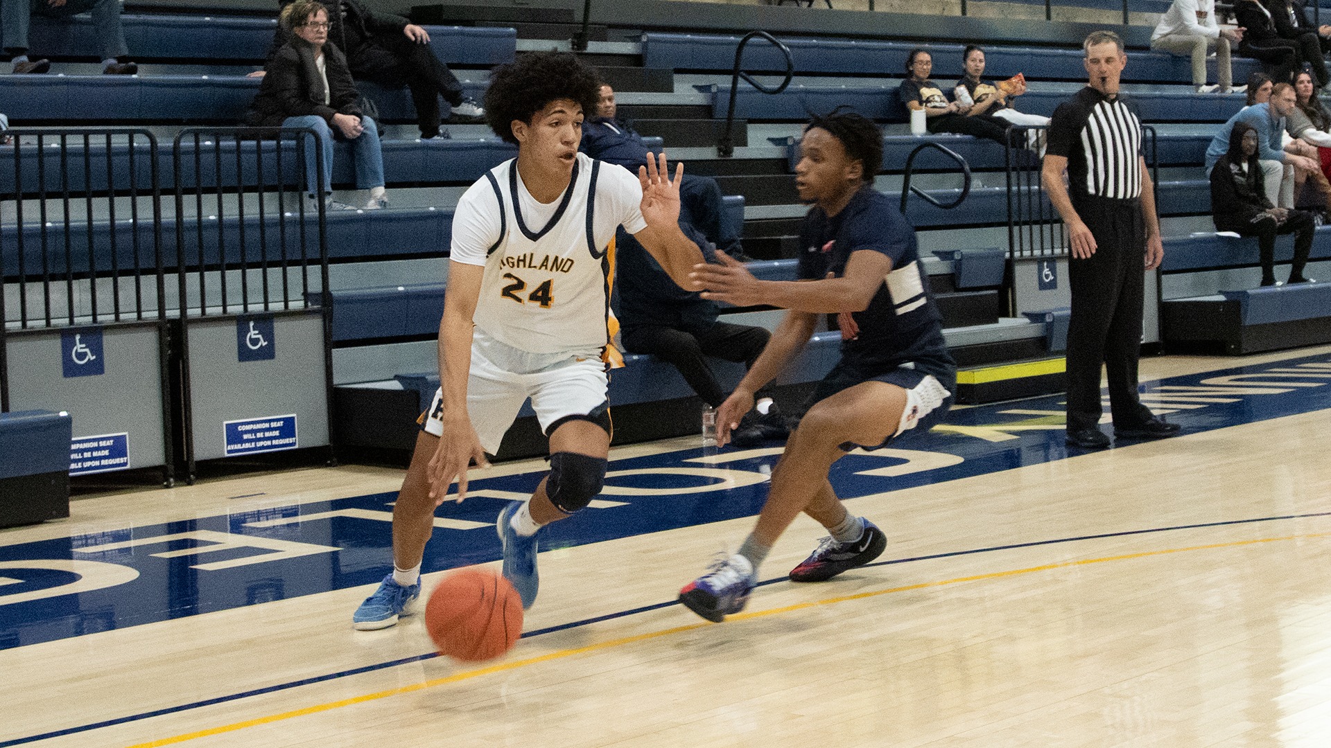 DJ Thomas drives past a Southwestern Community College defender in a 69-68 Highland win