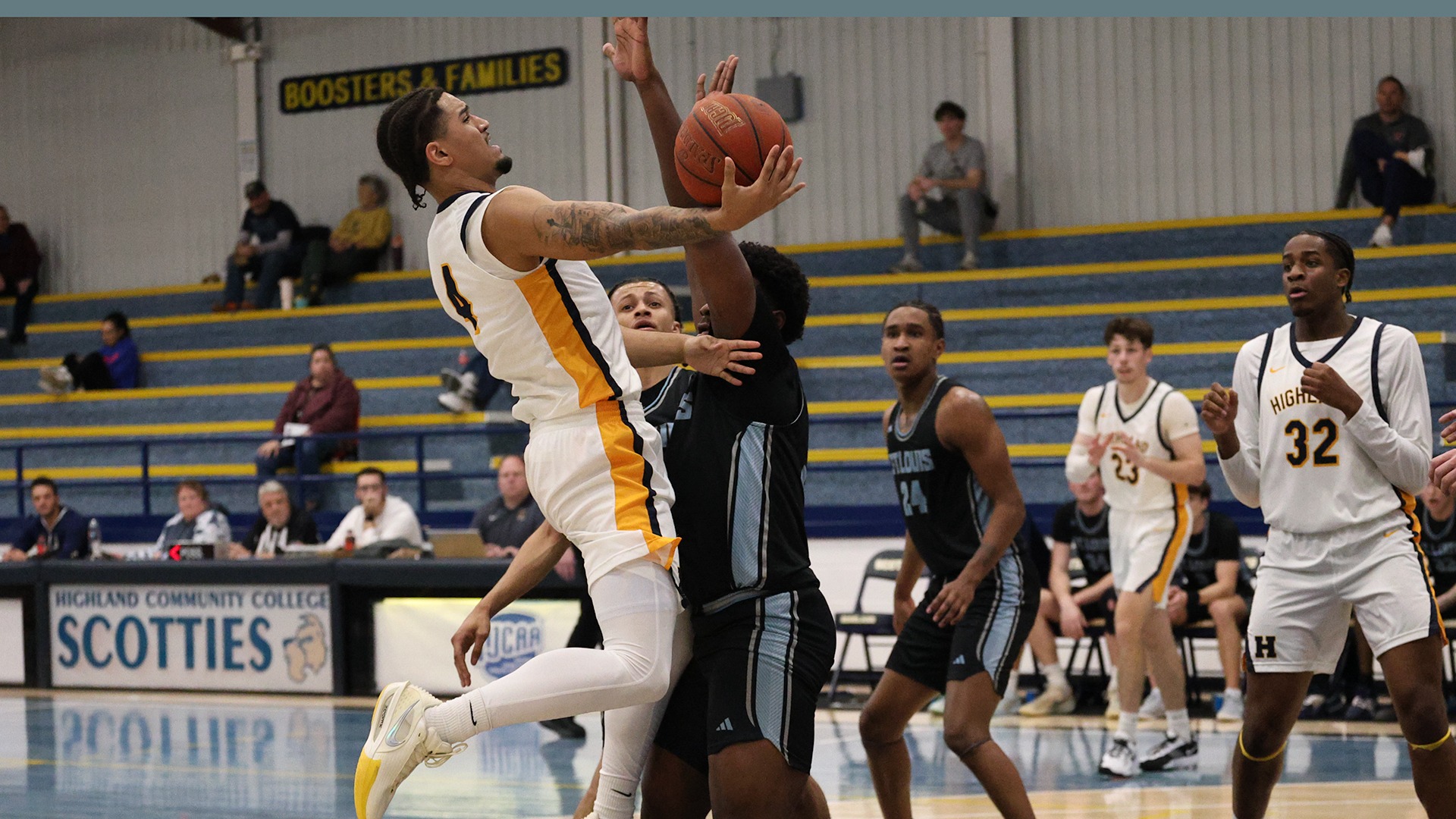 Tavian Tate powers through the lane for a bucket against St. Louis Community College