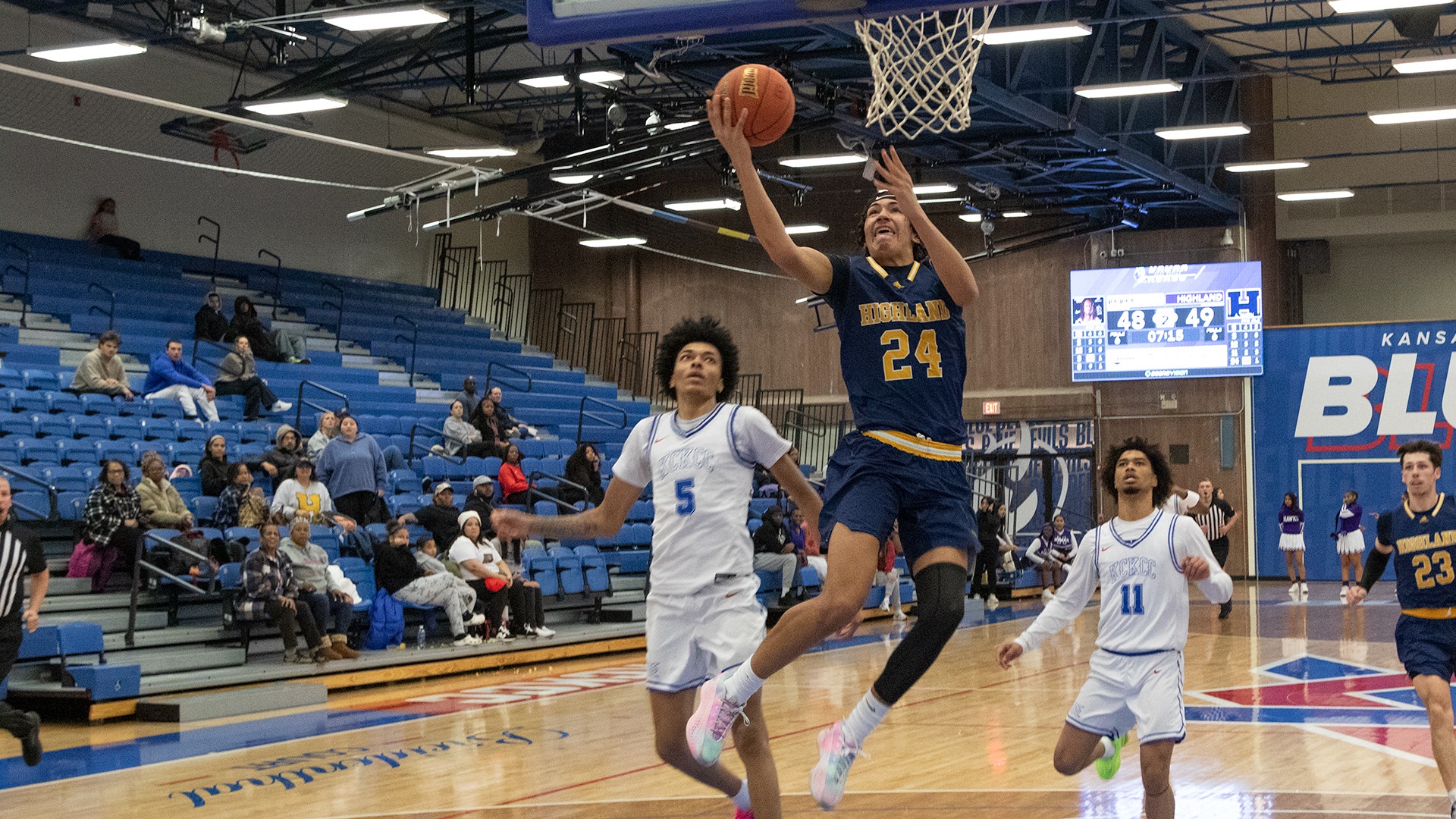 DJ Thomas flies through the lane for a fastbreak layup at Kansas City Kansas Community College