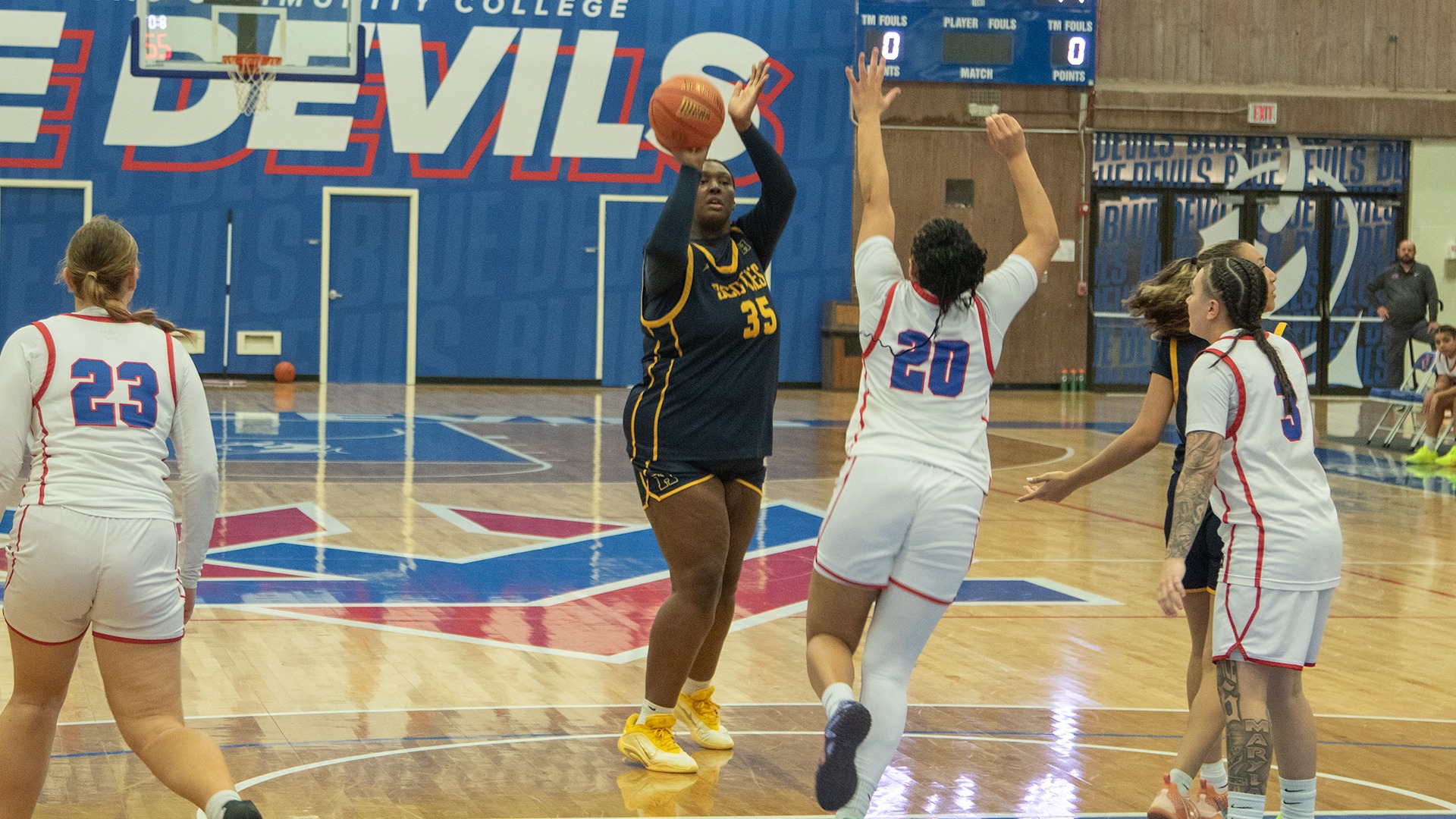 Shamiah Johnson knocks down a jumper from the top of the key at Kansas City Kansas Community College